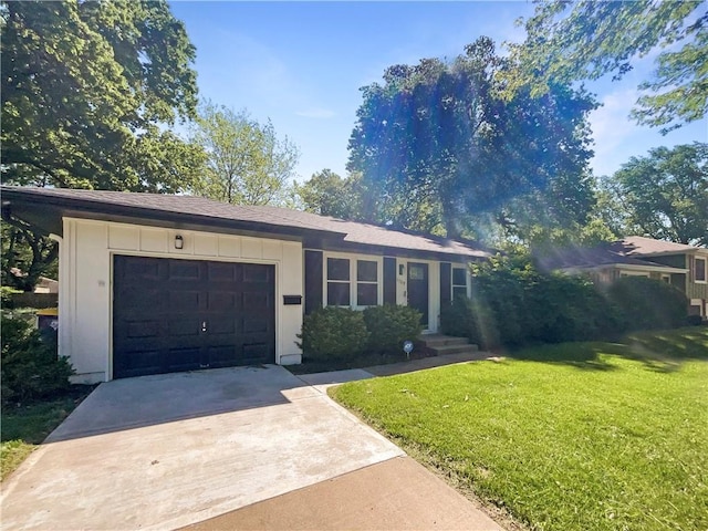 11709 Fremont Ave, Kansas City, MO 64134 - ranch-style home with a garage, driveway, a front lawn, and board and batten siding