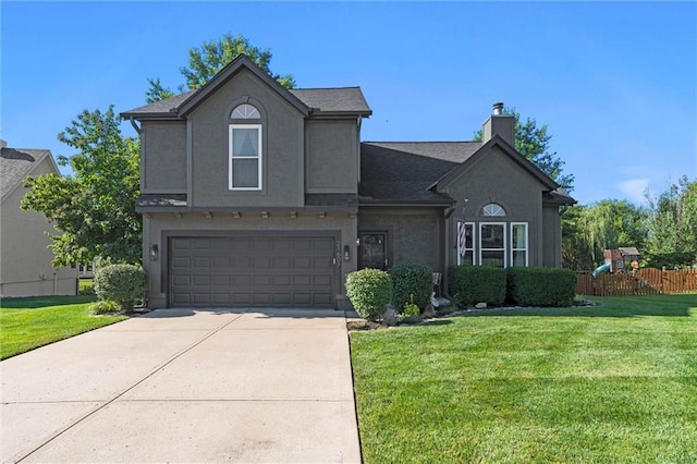 21607 W 51st St, Shawnee, KS 66226 - view of front of house featuring an attached garage, a chimney, concrete driveway, stucco siding, and a shingled roof