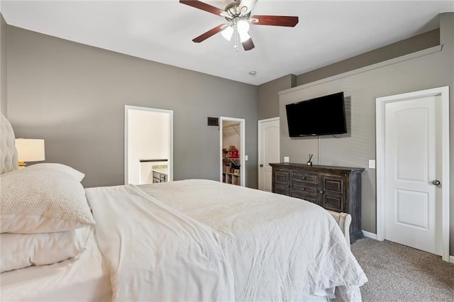 21607 W 51st St, Shawnee, KS 66226 - bedroom featuring carpet, ensuite bath, a ceiling fan, and a walk in closet