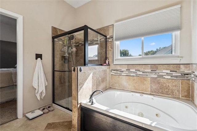 21607 W 51st St, Shawnee, KS 66226 - ensuite bathroom featuring a tub with jets and a stall shower