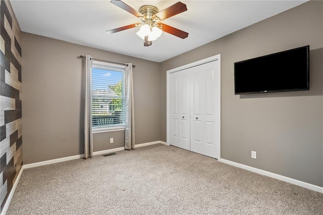21607 W 51st St, Shawnee, KS 66226 - unfurnished bedroom with carpet, a closet, and a ceiling fan