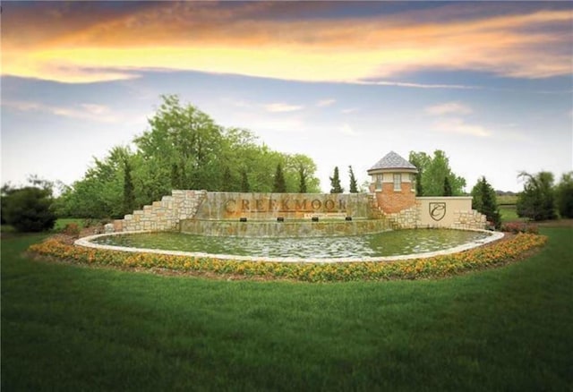 600 Mayfair Ct, Raymore, MO 64083 - view of property's community featuring a lawn