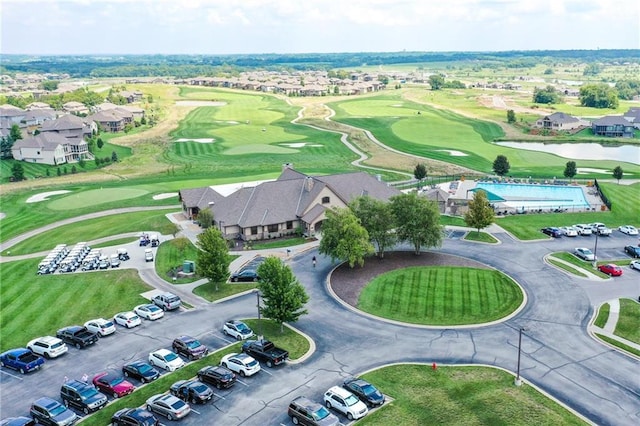 600 Mayfair Ct, Raymore, MO 64083 - aerial view of residential area featuring a local golf course and a large body of water