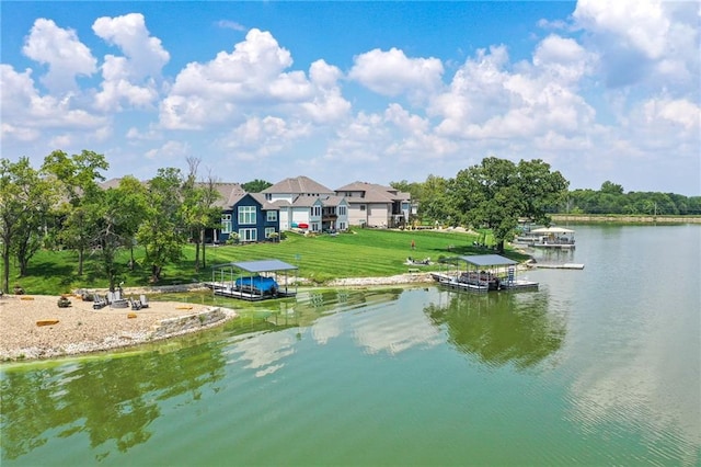 600 Mayfair Ct, Raymore, MO 64083 - water view featuring a dock