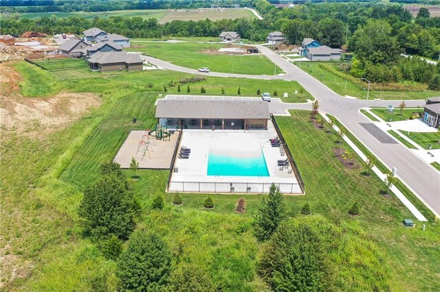 600 Mayfair Ct, Raymore, MO 64083 - bird's eye view of a pool