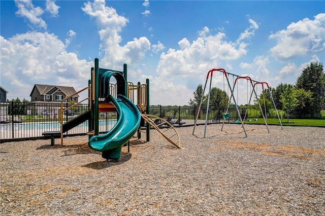600 Mayfair Ct, Raymore, MO 64083 - community playground featuring fence