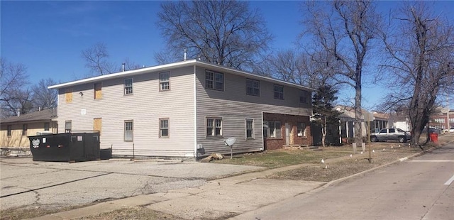 1910 S Joplin St, Pittsburg, KS 66762 - view of property exterior with asphalt driveway
