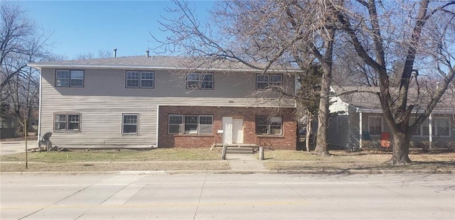 1910 S Joplin St, Pittsburg, KS 66762 - view of front of home featuring brick siding