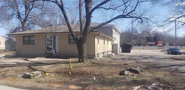 1910 S Joplin St, Pittsburg, KS 66762 - view of front of home with brick siding
