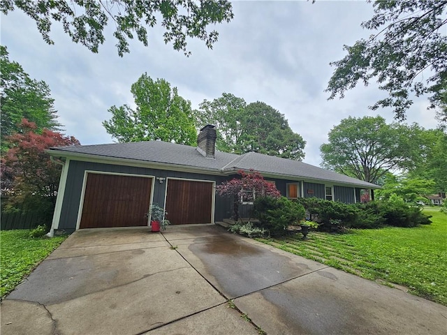 11306 E 45th St, Kansas City, MO 64133 - ranch-style house with an attached garage, a chimney, a front yard, and concrete driveway