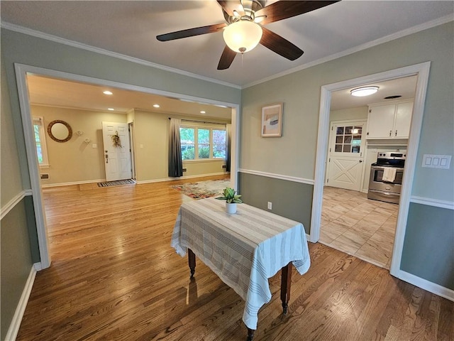 11306 E 45th St, Kansas City, MO 64133 - dining area featuring light wood-style floors, ornamental molding, a ceiling fan, baseboards, and recessed lighting