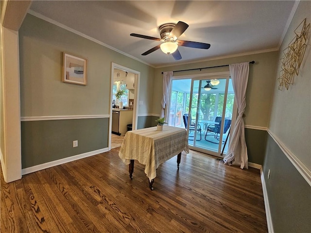 11306 E 45th St, Kansas City, MO 64133 - dining area with a ceiling fan, wood finished floors, ornamental molding, and baseboards
