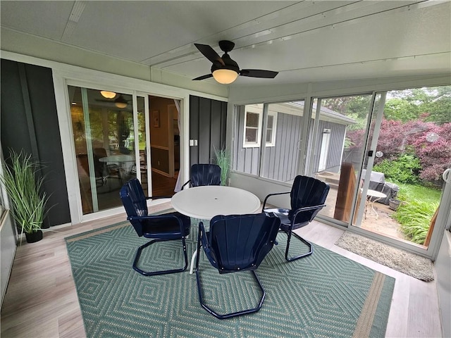 11306 E 45th St, Kansas City, MO 64133 - sunroom featuring ceiling fan and outdoor dining space