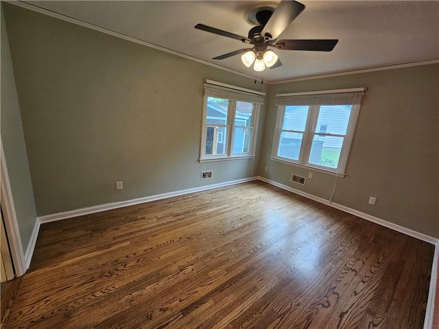 11306 E 45th St, Kansas City, MO 64133 - unfurnished room with ornamental molding, wood finished floors, a ceiling fan, and baseboards