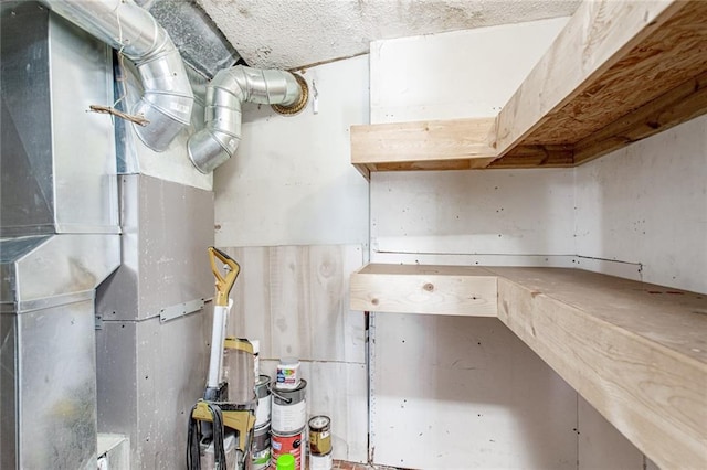 212 S Delaware St, Tonganoxie, KS 66086 - utility room with heating unit