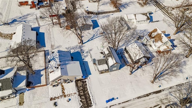 212 S Delaware St, Tonganoxie, KS 66086 - snowy aerial view with a residential view