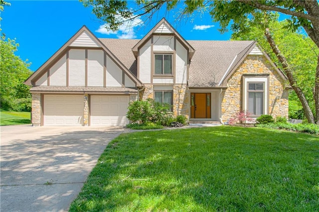 17725 W 68th Ter, Shawnee, KS 66217 - view of front of home featuring stone siding, driveway, stucco siding, an attached garage, and a front lawn