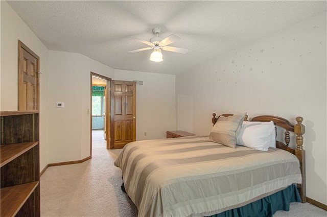 17725 W 68th Ter, Shawnee, KS 66217 - bedroom with light colored carpet, baseboards, a ceiling fan, and a textured ceiling