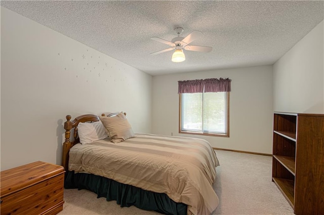 17725 W 68th Ter, Shawnee, KS 66217 - bedroom with light carpet, a textured ceiling, and a ceiling fan