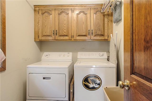 17725 W 68th Ter, Shawnee, KS 66217 - washroom with washing machine and dryer and cabinet space