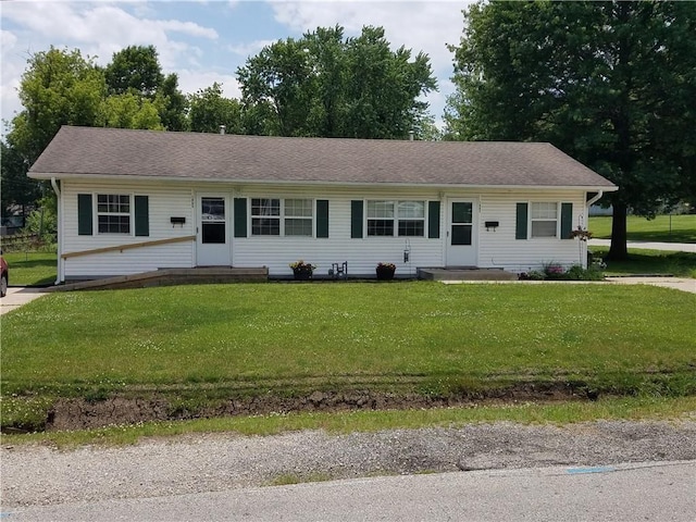 1903-05 High Grove Rd, Grandview, MO 64030 - ranch-style home with a front lawn
