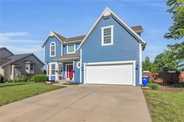 635 N Laurel St, Gardner, KS 66030 - traditional home featuring concrete driveway and an attached garage