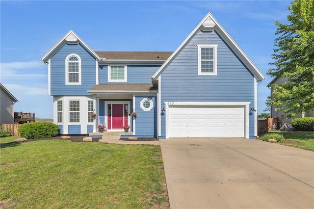 635 N Laurel St, Gardner, KS 66030 - traditional-style house featuring a front yard, concrete driveway, and roof with shingles