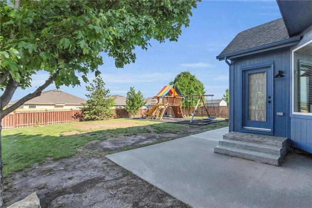 635 N Laurel St, Gardner, KS 66030 - view of yard featuring a playground and a patio area