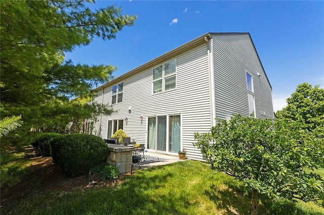 5412 Fairmount Ave, Kansas City, MO 64118 - back of house with a patio area
