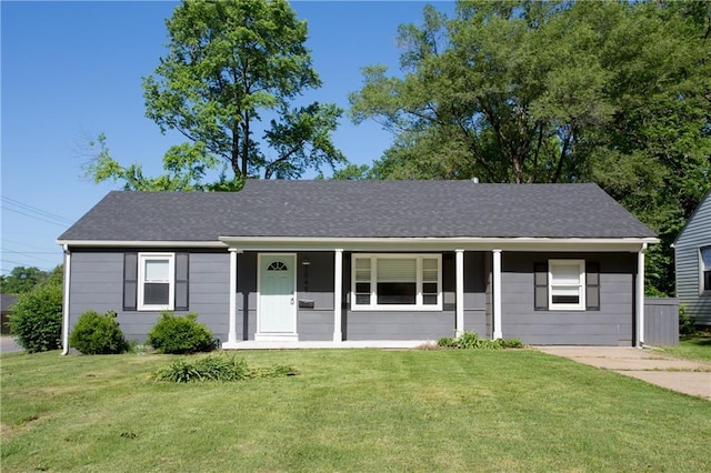 7048 Horton St, Overland Park, KS 66204 - single story home featuring a porch and a front lawn