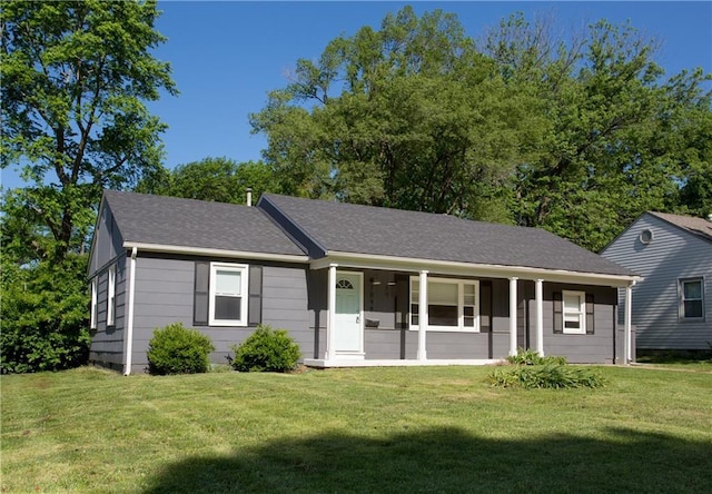 7048 Horton St, Overland Park, KS 66204 - single story home with covered porch, a front yard, and roof with shingles