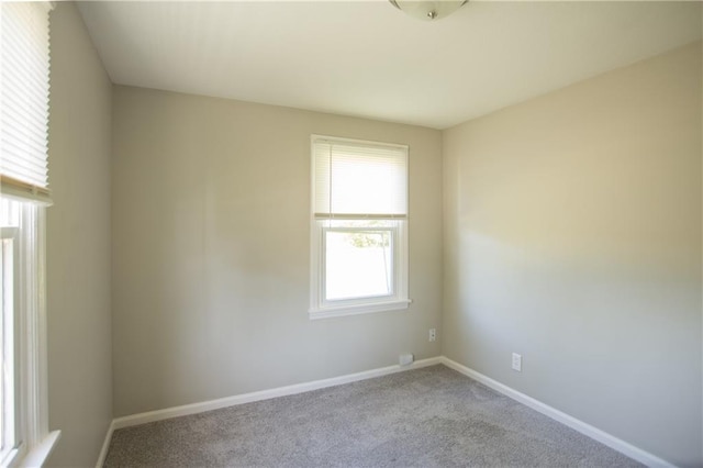 7048 Horton St, Overland Park, KS 66204 - carpeted spare room featuring baseboards