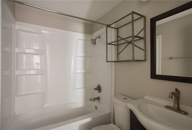 7048 Horton St, Overland Park, KS 66204 - bathroom featuring bathtub / shower combination, toilet, and vanity