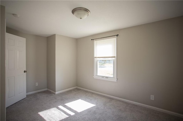 7048 Horton St, Overland Park, KS 66204 - carpeted spare room with baseboards