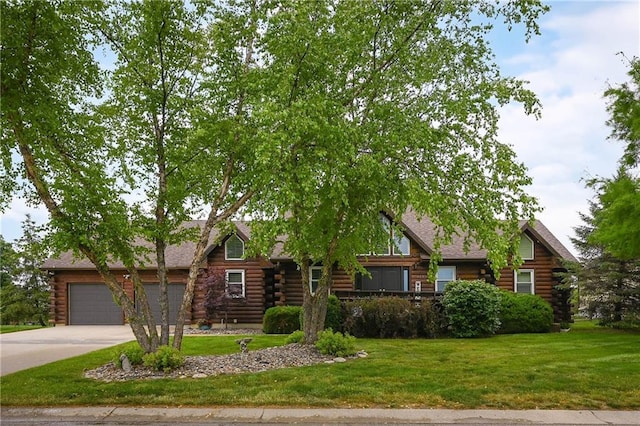 611 N Winnebago Dr, Lake Winnebago, MO 64034 - cabin featuring log siding, driveway, a front yard, and an attached garage