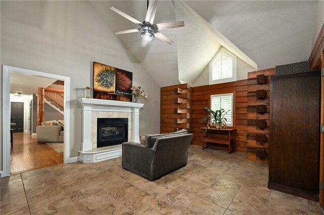 611 N Winnebago Dr, Lake Winnebago, MO 64034 - living room with high vaulted ceiling, ceiling fan, and a fireplace