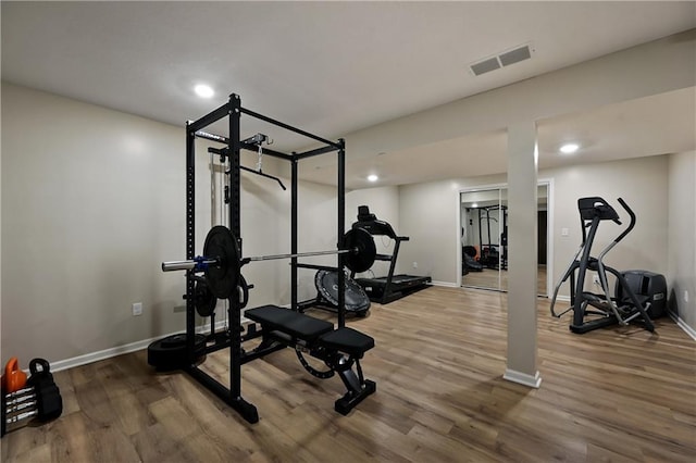 611 N Winnebago Dr, Lake Winnebago, MO 64034 - exercise room featuring wood finished floors, baseboards, and recessed lighting