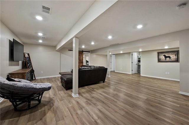 611 N Winnebago Dr, Lake Winnebago, MO 64034 - living area with light wood finished floors, baseboards, and recessed lighting