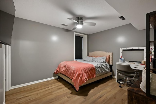 611 N Winnebago Dr, Lake Winnebago, MO 64034 - bedroom featuring wood finished floors, baseboards, a desk, and ceiling fan