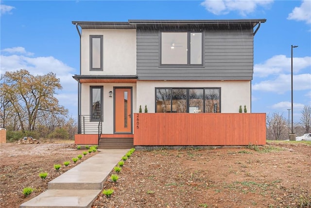 2605 W Paseo Blvd, Kansas City, MO 64108 - contemporary house featuring stucco siding