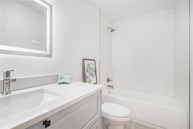 2605 W Paseo Blvd, Kansas City, MO 64108 - bathroom featuring vanity, toilet, tub / shower combination, and tile patterned floors