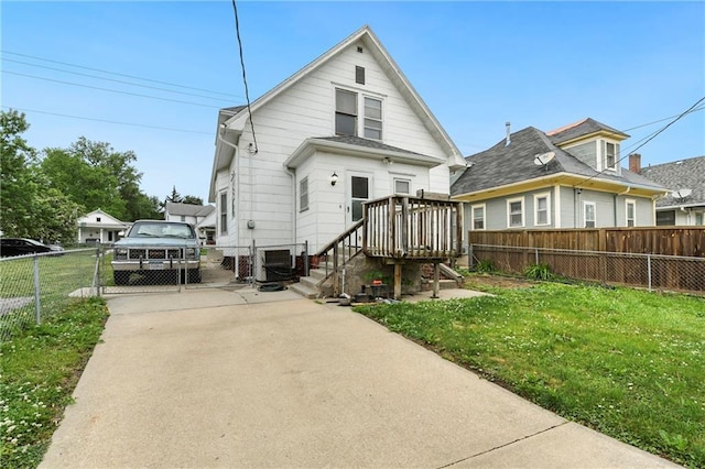 3121 Saint Joseph Ave, Saint Joseph, MO 64505 - rear view of property featuring concrete driveway and central AC unit