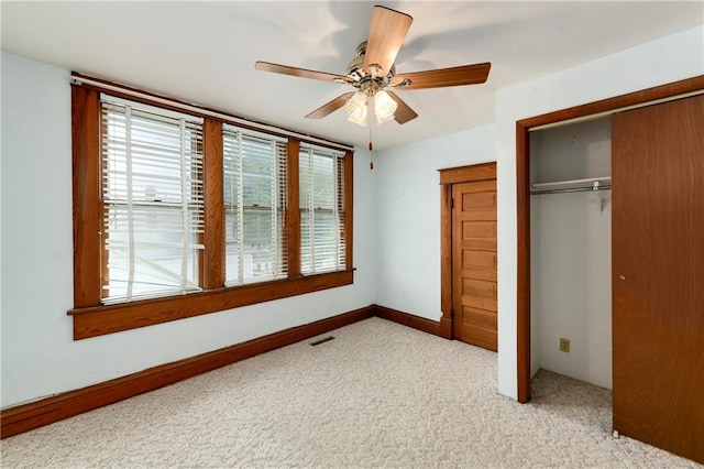 3121 Saint Joseph Ave, Saint Joseph, MO 64505 - unfurnished bedroom with a closet, carpet floors, and ceiling fan