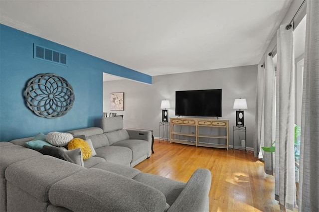 9520 Lamar Ave, Overland Park, KS 66207 - living area with hardwood / wood-style flooring and baseboards