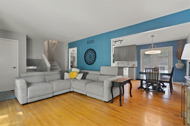 9520 Lamar Ave, Overland Park, KS 66207 - living area with light wood finished floors