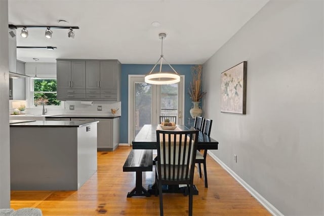 9520 Lamar Ave, Overland Park, KS 66207 - dining space with light wood-type flooring and baseboards
