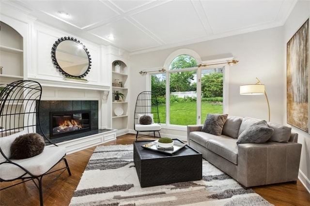 5403 Windsor Ln, Fairway, KS 66205 - living room featuring a tile fireplace, wood finished floors, built in features, ornamental molding, and baseboards