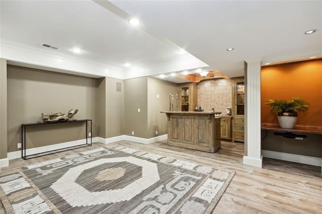 5403 Windsor Ln, Fairway, KS 66205 - indoor wet bar featuring ornamental molding, light wood-style flooring, recessed lighting, and baseboards