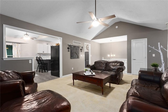 1512 Auburn Dr, Lees Summit, MO 64086 - living room with ceiling fan, lofted ceiling, light colored carpet, and baseboards