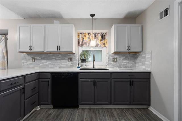 1512 Auburn Dr, Lees Summit, MO 64086 - kitchen featuring black dishwasher, a sink, gray cabinets, dark wood-style flooring, and backsplash
